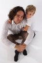 A pretty fair hair child boy hugging his daddy Royalty Free Stock Photo