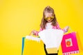 Colorful casual child girl isolated on yellow background Royalty Free Stock Photo