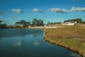 Pretty farm with fences, livestock sheds and lake