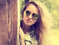 Pretty Fashion Hipster Girl in Glasses Peeking