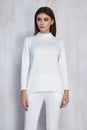 pretty fashion woman wear white casual sport suit trend clothes collection catalogue long brunette hair party style model