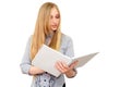 Pretty female blonde student reading books on white isolated background Royalty Free Stock Photo