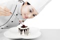 Pretty female chef with dessert Royalty Free Stock Photo