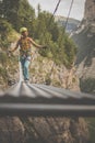 Pretty, female climber on a via ferrata Royalty Free Stock Photo