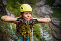 Pretty, female climber on a via ferrata Royalty Free Stock Photo