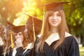 Pretty female college graduate at graduation Royalty Free Stock Photo