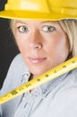 Pretty female construction worker hard hat helmet Royalty Free Stock Photo