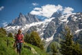 Pretty, female hiker/climber in a lovely alpine setting