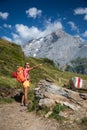 Pretty, female hiker/climber in a lovely alpine setting