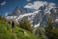 Pretty, female hiker/climber in a lovely alpine setting