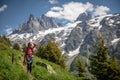 Pretty, female hiker/climber in a lovely alpine setting