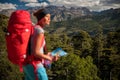 Pretty, female hiker in high mountains Royalty Free Stock Photo