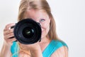 Pretty, female photographer with her digital camera Royalty Free Stock Photo