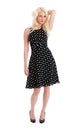 Pretty female in polker dot dress isolated