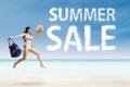 Pretty female with summer sale cloud Royalty Free Stock Photo