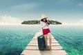 Pretty female tourist standing on jetty 1 Royalty Free Stock Photo