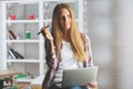 Pretty female using laptop at workplace Royalty Free Stock Photo