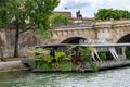 Pretty floating restaurant on the Seine river, Paris