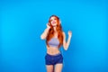 Pretty foxy slim girl listening to music with headphones. Close up portrait of charming beautiful nice funny funky glad excited pr Royalty Free Stock Photo