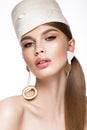 Pretty fresh girl, image of modern Twiggy in fashionable white hat, with unusual eyelashes and accessories. Royalty Free Stock Photo