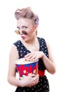 Pretty funny young blond elegant pinup woman with curlers round glasses Royalty Free Stock Photo