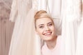 Pretty future bride is making fun in boutique Royalty Free Stock Photo