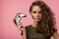 Pretty gamer girl on pink background