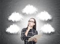 Pretty geek girl in glasses, thought clouds