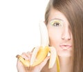 Pretty girl with banana isolated on white. Royalty Free Stock Photo