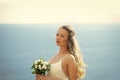 Pretty girl or beautiful bride on blue sea Royalty Free Stock Photo