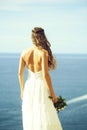 Pretty girl or beautiful bride on blue sea Royalty Free Stock Photo