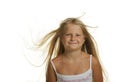 The pretty girl the blonde with flying hair Royalty Free Stock Photo