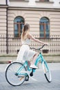 Pretty girl with a blue bike Royalty Free Stock Photo