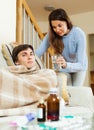 Pretty girl caring for sick husband