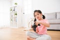 Pretty girl children daughter playing video games Royalty Free Stock Photo