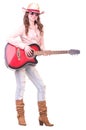 Pretty girl with cowboy hat with guitar Royalty Free Stock Photo