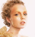 Styled Golden Woman's Face. Curly Hair. Professional Bronzed Makeup