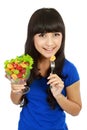 Pretty girl eating fruit salad Royalty Free Stock Photo