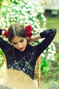 Pretty girl with fashionable spanish makeup, rose flower in hair Royalty Free Stock Photo