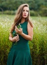 Pretty girl with flowers in her hand Royalty Free Stock Photo