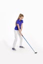 Pretty girl golfer on white backgroud in studio Royalty Free Stock Photo