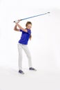 Pretty girl golfer on white backgroud in studio Royalty Free Stock Photo
