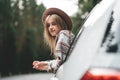 Pretty girl hipster enjoying country road. Lifestyle concept