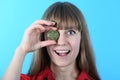 Pretty Girl holding in front of her new golden cryptocurrency bitcoin in hands Royalty Free Stock Photo