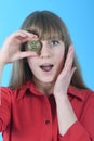 Pretty Girl holding in front of her new golden cryptocurrency bitcoin in hands Royalty Free Stock Photo