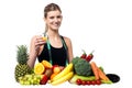 Pretty girl holding glass of fresh juice Royalty Free Stock Photo