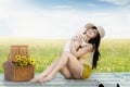 Pretty girl hugging a dog at field Royalty Free Stock Photo