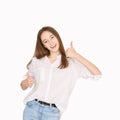 Happy smile emotion. Thumb up like gesture. Attractive teenager