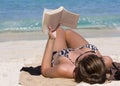 A pretty girl lays out on the beach Royalty Free Stock Photo