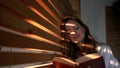 Pretty Girl With Long Hair Reads Book. Royalty Free Stock Photo